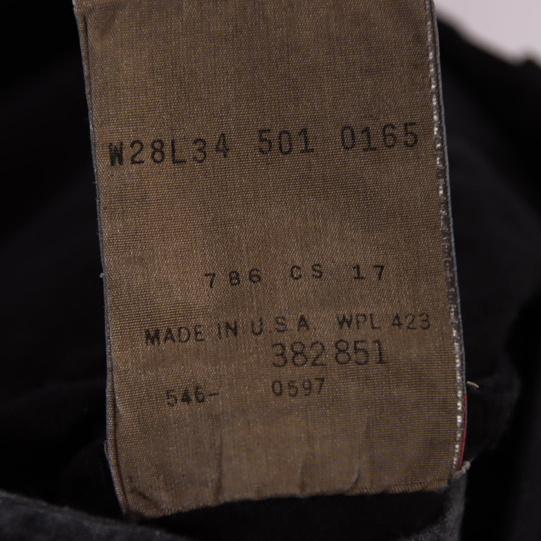 Levi's 501 regular fit W28 L34 jeans vintage in denim nero da donna made in USA deadstock