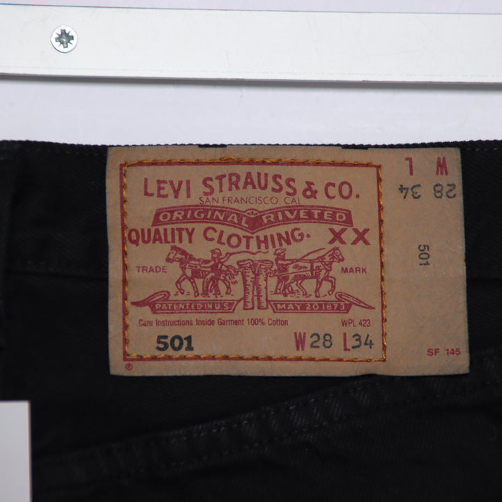 Levi's 501 regular fit W28 L34 jeans vintage in denim nero da donna made in USA deadstock