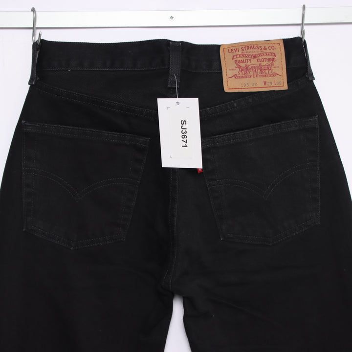 Levi's 595 straight fit W29 L32 jeans vintage in denim nero da donna deadstock