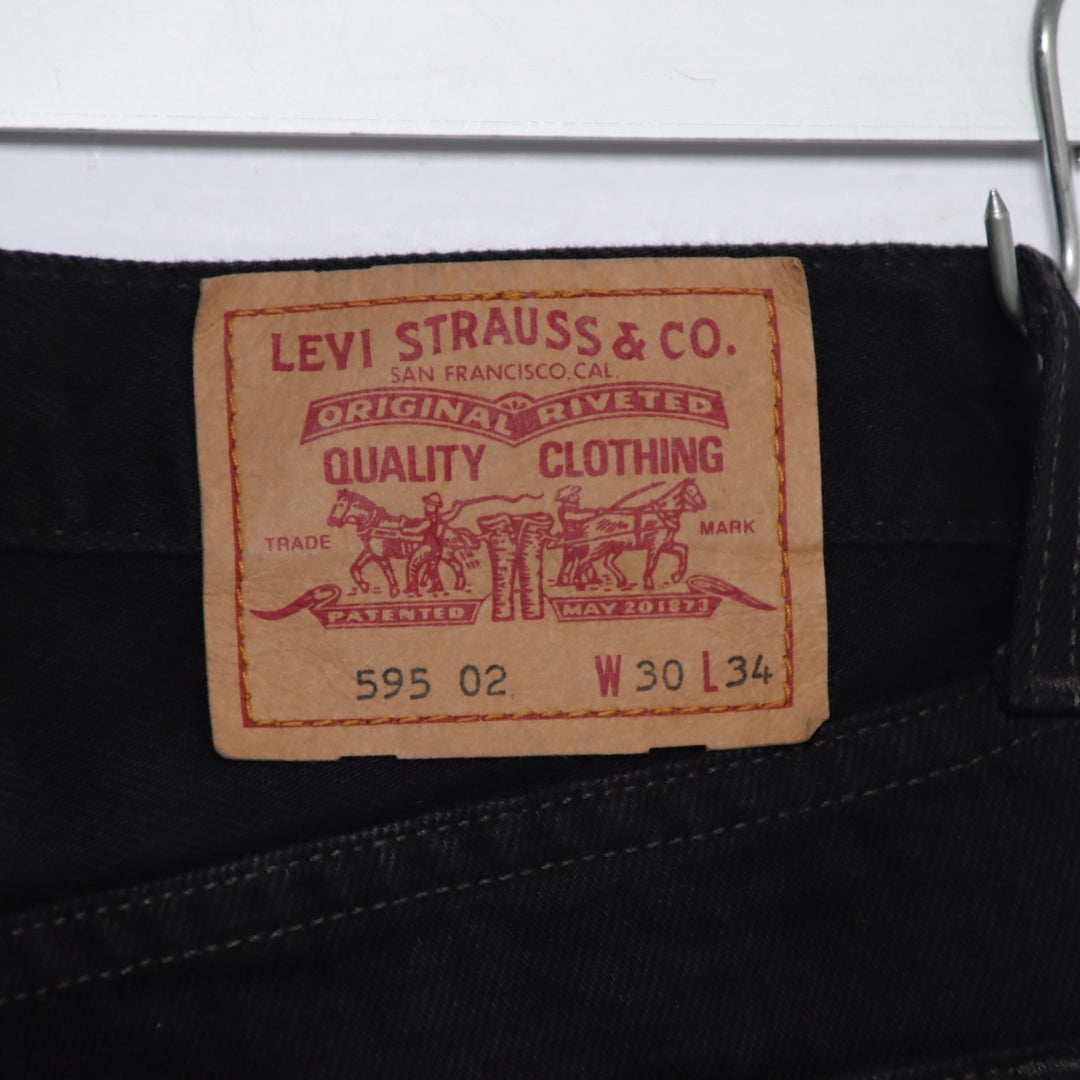 Levi's 595 straight fit W30 L34 jeans vintage in denim nero da donna deadstock