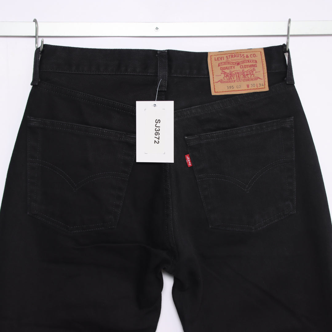 Levi's 595 straight fit W30 L34 jeans vintage in denim nero da donna deadstock