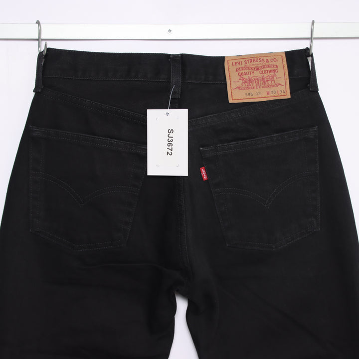 Levi's 595 straight fit W30 L34 jeans vintage in denim nero da donna deadstock