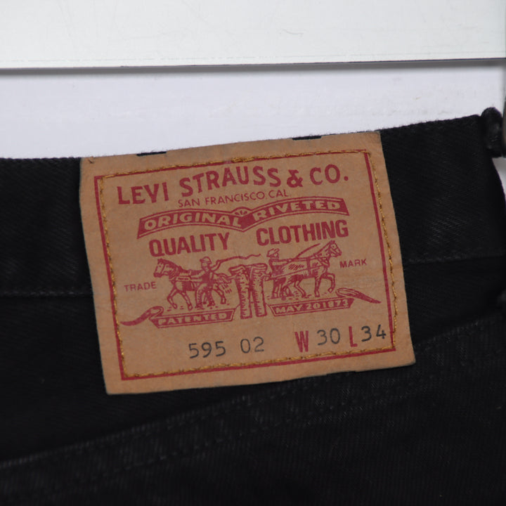Levi's 595 straight fit W30 L34 jeans vintage in denim nero da donna deadstock