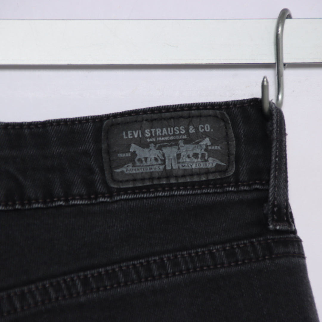 Levi's mid rise skinny W29 jeans in denim nero da donna