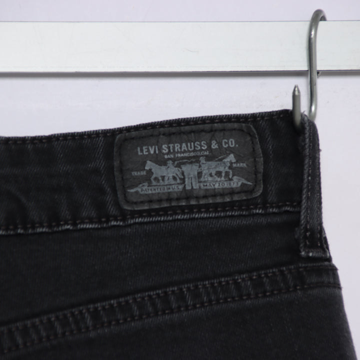 Levi's mid rise skinny W29 jeans in denim nero da donna